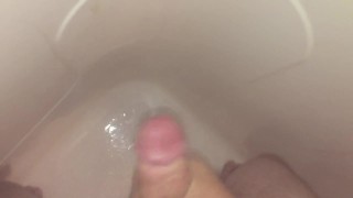 Horny Scott jerks spits on his cock and jerks it in the shower until he cums