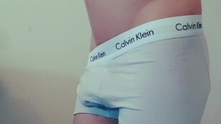 desperate twink pissing in a bottle