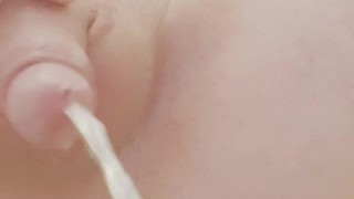 twink plays with his piss and ass