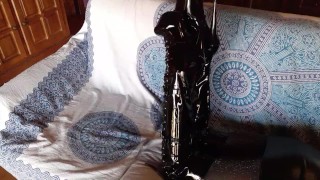 Laura on Heels amateur 2021 on a sofa wearing black sexy platform boots over the knees