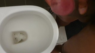 Pissing. Black dick urinal piss and wank