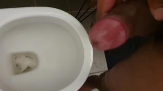 Pissing. Black dick urinal piss and wank