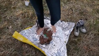 Crush of Easter egg in barefoot