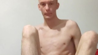 Very Skinny blonde plays with his face mask and puts his teddy bear clothes on himself