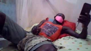 YONG LAD JERKS OFF AND CUM LAYING AND WATCHING PORN