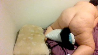 big woman rides chicken pillow and cums