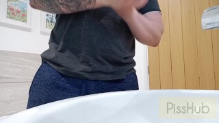 Non-chalant piss in sink