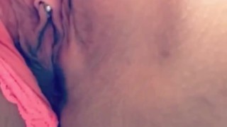 Slutty girl plays with a pussy for camera