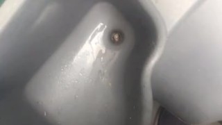Pissing in a nasty Port a Potty 