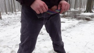 Peeing in the woods during snowfall
