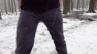 Peeing in the woods during snowfall
