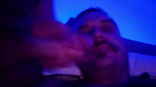 Gay bloke has his big hairy cock worshipped by boyfriend on the couch