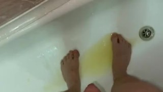 Male Pissing In The Bath