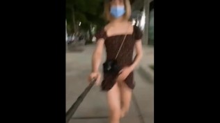 Ladyboy Walking the Street With Her Cock Outside for Some Fresh Air 