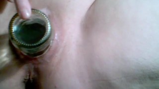 Jamming a glass coke bottle in my shaved pussy, an older video
