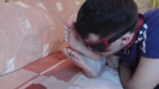 Slave kisses feet of his pregnant wife while she chatting with her lover