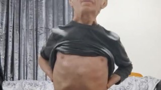 Very skinny teen puts on an old man face on himself and shows off his body while in briefs
