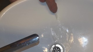 Peeing in the bathroom sink