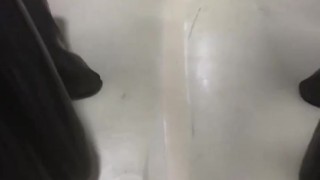 Handjob wearing latex catsuit with latex sheath inside