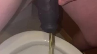 She used a Female to Male (FTM) Stand to Pee (STP) device for the first time & made a little mess