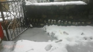 Stranger girl pissing in back yard to snow