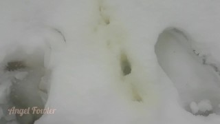 Stranger girl pissing in back yard to snow