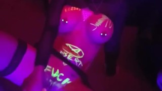 Black Light dildo in video game room body paint