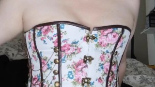 Corseted Lady Strokes her Clitty
