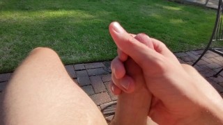 Jacking off outside in back yard while neighbors are out talking