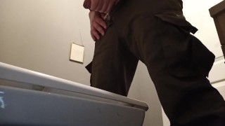 pee in a public toilette