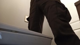 pee in a public toilette
