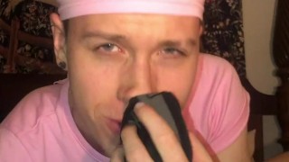 Jesse Gold plays around in a crop top, headband, and thong