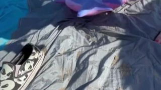 BBW milf crushes floatie in public at the beach