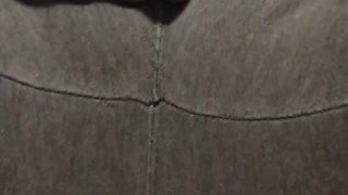Gray sweatpants wetting peed pants