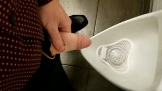 Ginger showing off in public restroom 