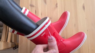 Cum on red rubberboots