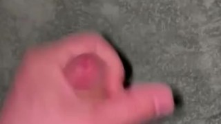 guy jerking off big uncut cock on his knees cums with moans