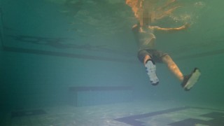 Swimming in clothes underwater