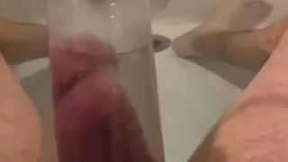 Penis pump in the tub