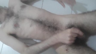 Hairy Israeli otter jerking lying on the floor