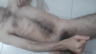 Hairy Israeli otter jerking lying on the floor
