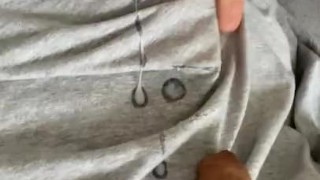 Thick veiny cock ejaculates on Tshirt