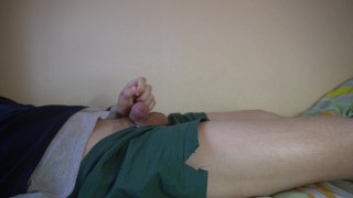 Handsome plays with cock
