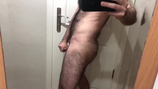 hairy man magnify cock in front of the mirror