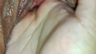 Tight pussy squeezes fingers