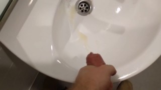 Stroking my dick in the mall public bathroom