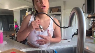 HORNY HOUSEWIFE GETS HER TITS SOAKED AND HAS A BODY SHAKING ORGASM ON THE COUNTER