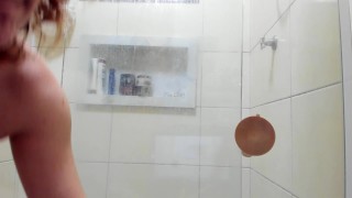 Taking a very hot and naughty shower, fucking my ass with a perfect view of my big ass
