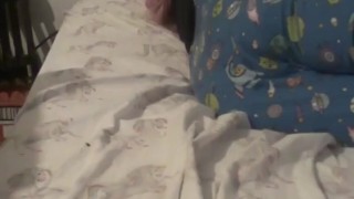 Watch your cute adult baby girl snuggle up in bed 