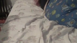 Watch your cute adult baby girl snuggle up in bed 